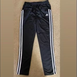Girl’s size 12/14 black Adidas sweatpants.